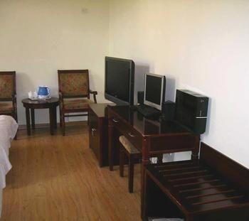شي نان Juranzhijia Business Hotel المظهر الخارجي الصورة