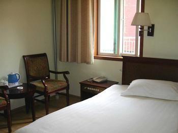 شي نان Juranzhijia Business Hotel المظهر الخارجي الصورة